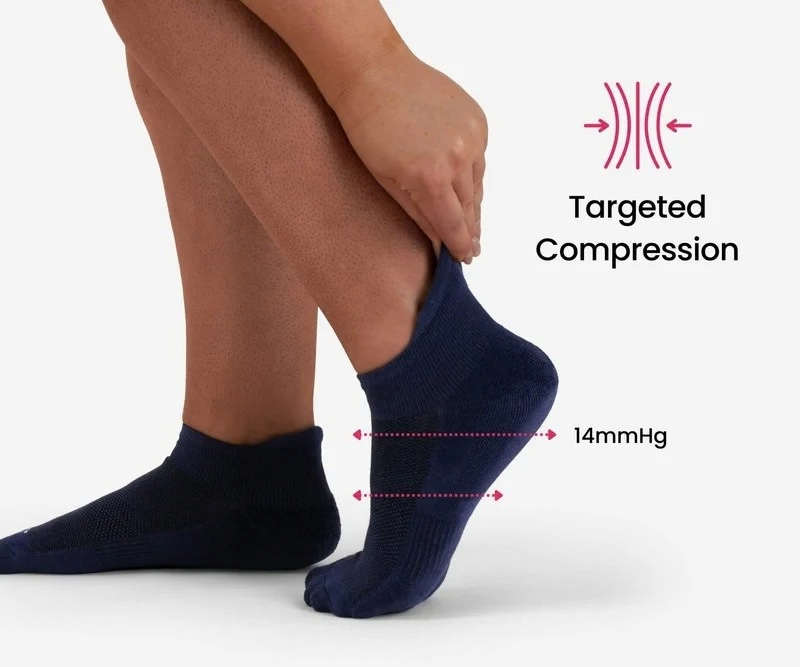 Woman wearing beige bamboo compression socks